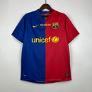 camisa-camiseta-barcelona-nike-unicef-versao-versao-torcedor-masculina-08-09-home-casa-i-principal-1-vermelho-vermelha-azul-amarela-amarelo-retro-retro-lionel-messi-xavi-iniesta_1