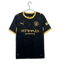 camisa-camiseta-manchester-city-puma-etihad-airways-versao-torcedor-masculina-26-27-away-fora-ii-secundaria-2-dourado-dourada-azul-preta-preto_1