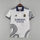 camisa-camiseta-real-madrid-adidas-emirates-fly-better-versao-versao-torcedor-masculina-22-23-edicao-edicao-especial-branca-azul-dragao_1_7d95fd6b-c90c-4fb4-8938-cf244c85fd29